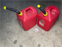 Two 5 gal fuel containers