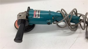 Makita 5 inch angle grinder brought over
