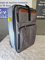 Grey suitcase on wheels