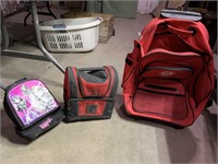 2 lunch boxes and bag on wheels