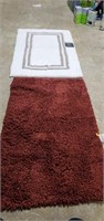 1 accent rug & 1 spa bath rug
