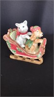 Salt and pepper shakers cat and dog on sleigh