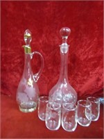 Etched decanters and 5 glasses.