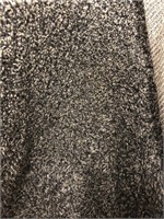 Black and white shag rug, 8 feet wide