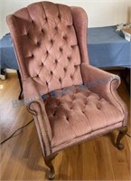Rose colored diamond tufted wing back chair