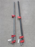 2 LONG METAL CLAMPS (APPROX 4')