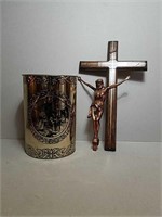 Crucifix and Pressed Wastebasket.
