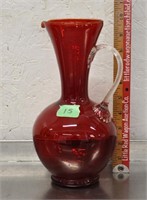 Vintage red glass pitcher, applied handle