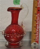 Vintage red glass pitcher, applied handle, etc.