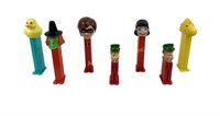 Pez dispensers. Lucy from peanuts, green witch,