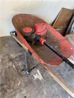 Metal wheelbarrow with craftsman electric edger