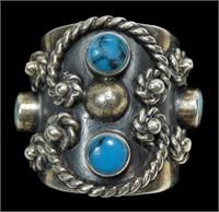 Mexican sterling silver bezel set turquoise ring,