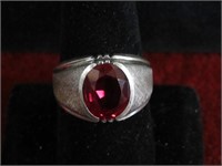 Sterling Silver Ring. Faceted red stone. NICE.