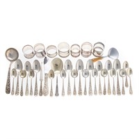 Assorted silver flatware and napkin rings