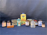 Group of Vintage tins and glass medicine bottles