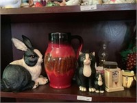 Second shelf of pitcher, bunnies, planters