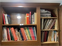 2 shelves and cabinet of cookbooks