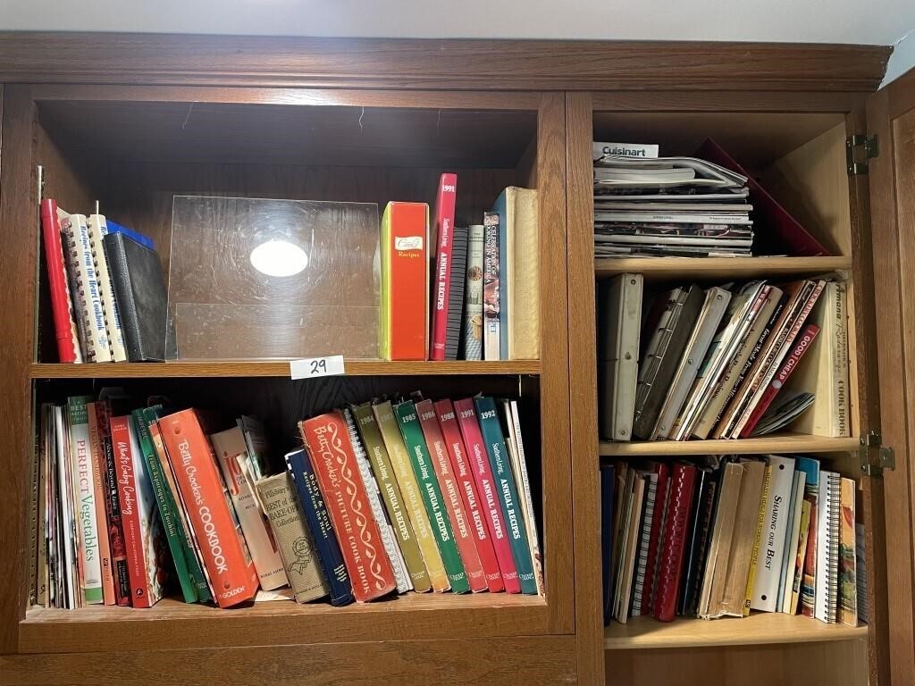 2 shelves and cabinet of cookbooks
