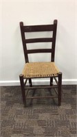 Vintage ladder-back chair with woven seat