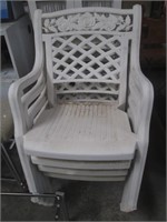 Four White Heavy Plastic Patio Chairs