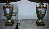 Pair of Paris porcelain decorated urns mounted as