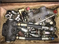 Box of Hydraulic Valves and assorted fittings.
