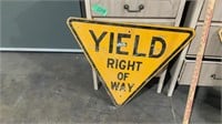 Vintage heavy, metal yield sign