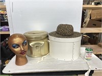 Decorative bins with mannequin head and hat