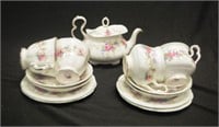 Four Royal Albert "Colleen" trios, and a teapot