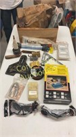 Tool belt, MIG wire, clamp, glue spreader, safety