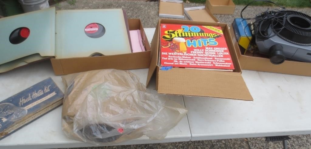 German records, slide projector, hostess kit