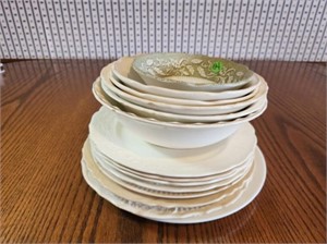 Stack of Vintage Plates and Bowls