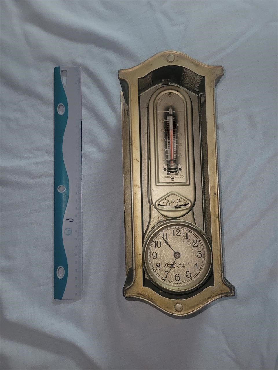 Antique thermometer clock