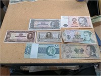 Lot of seven bills of money from Latin American