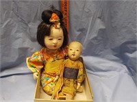 2 Oriental dolls