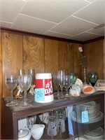 housewares contents on top of china cabinet