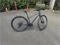 BLACK BIKE WITH DISC BRAKES  AND SHIMANO SHIFTERS
