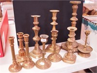 10 brass candleholders including two pairs,