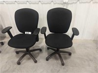 2 BLACK OFFICE CHAIRS WITH ARMS ON CASTORS