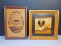 2 wooden framed air balloon pictures