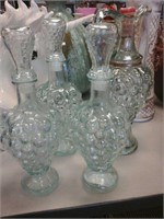 Set of 4 crystal bottle with grapes on  them