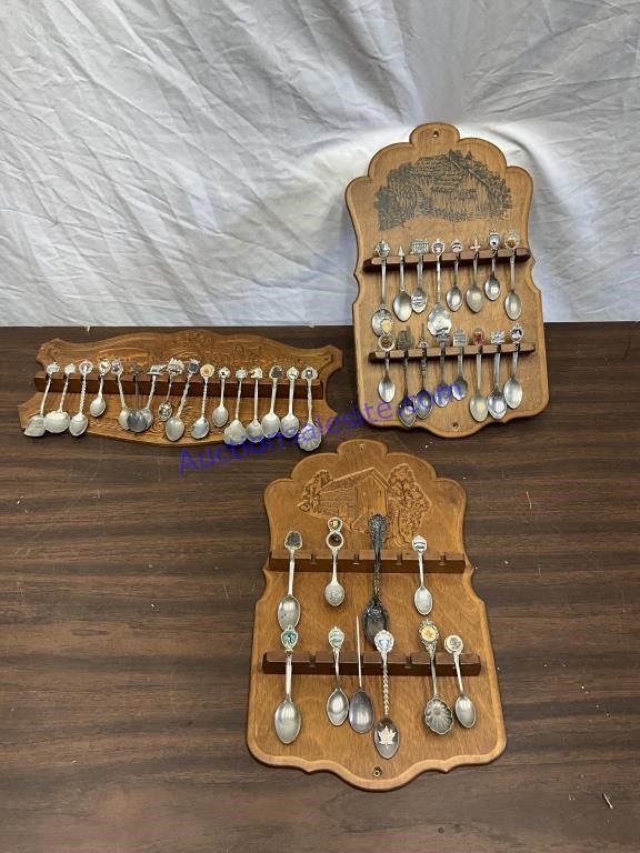 Antique silver spoons with displays