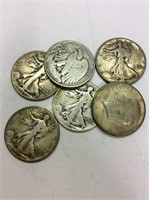 Lot of six circulated silver half dollars