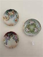 Three Hand-Painted Porcelain Floral Plates includi