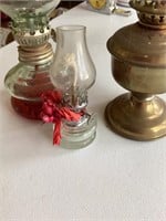 3 small kerosene lanterns.  Bottle to show size