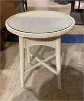 Very nice wicker side table with glass table top