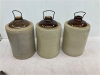 3 pottery jugs. 12” high. No visible cracks.