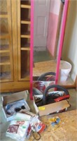 Pink vertical mirror, hand vacuum sweeper