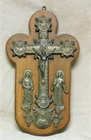 Ornate Crucifix with Saints Mounted on Oak Plaque.