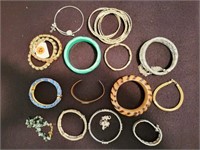 COLLECTION OF COSTUME BRACELETS: BANGLES, CUFFS